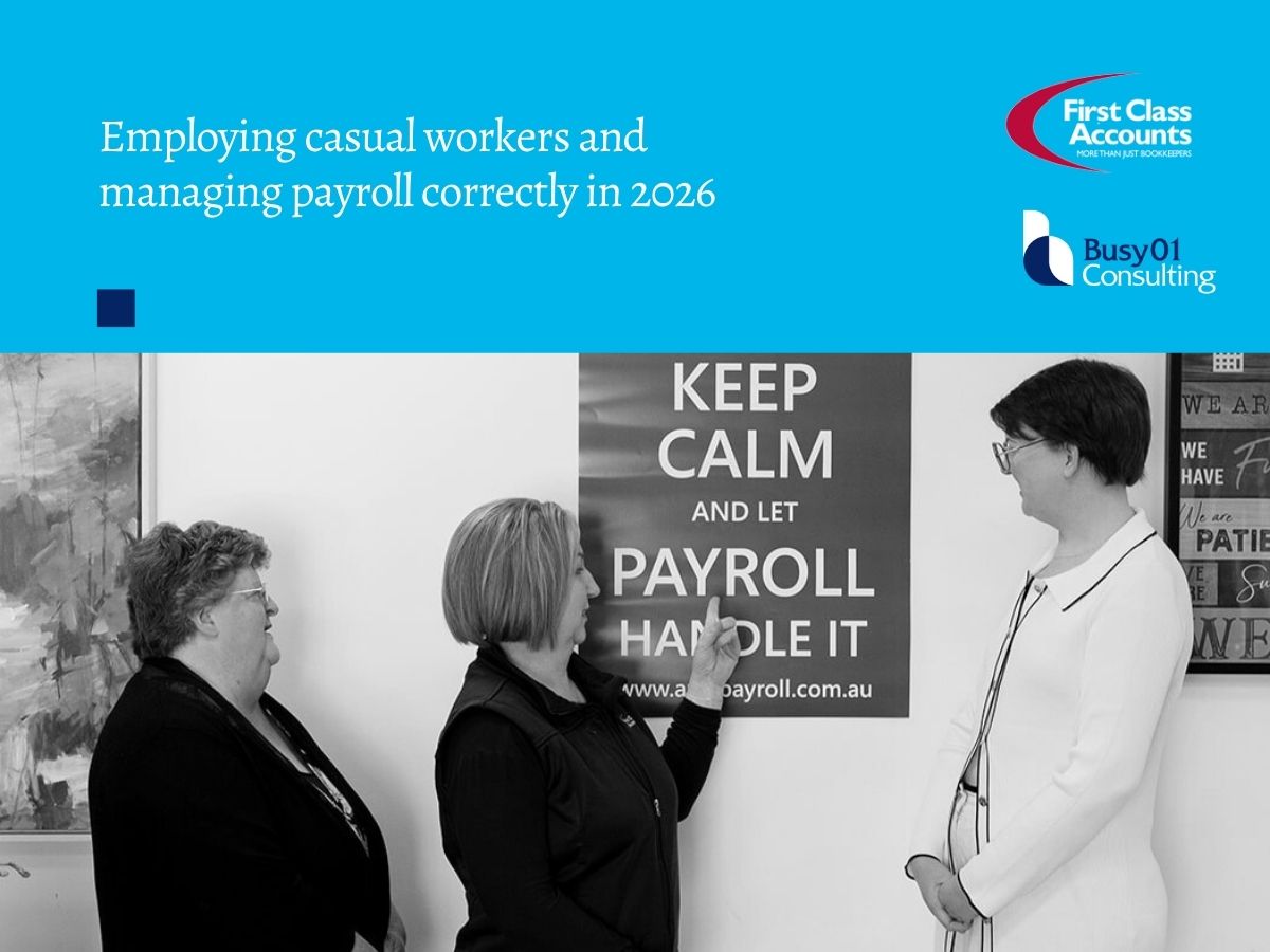 Three members of the First Class Accounts Ovens & Murray and Busy01 Consulting team standing in an office, looking at a sign that reads “Keep calm and let payroll handle it,” representing professional payroll support for businesses employing casual staff.