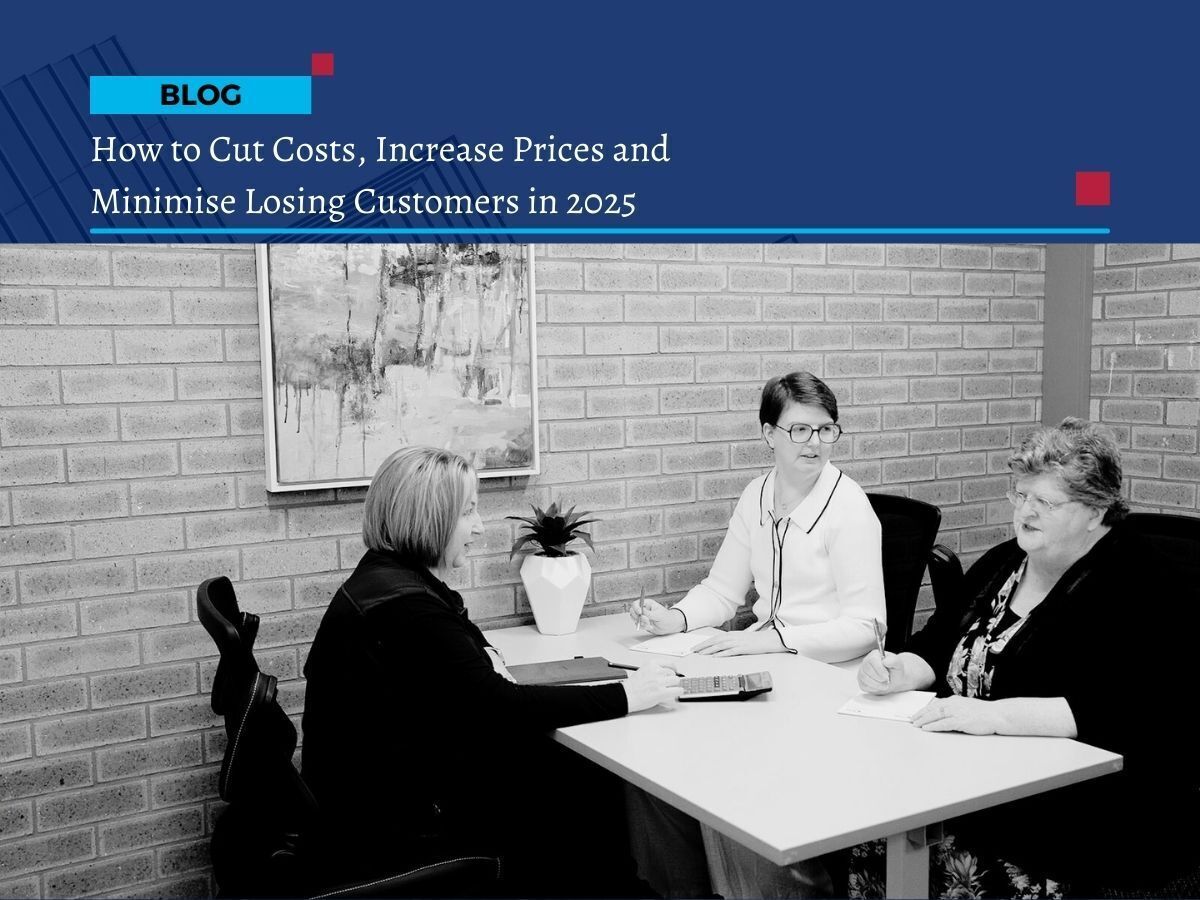 Three women in a business meeting discussing bookkeeping and cost strategies at First Class Accounts Ovens & Murray.