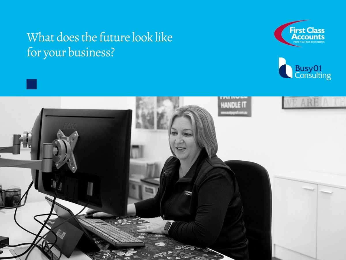 First Class Accounts Ovens & Murray team member working at computer reviewing business data to support clients with planning ahead in business