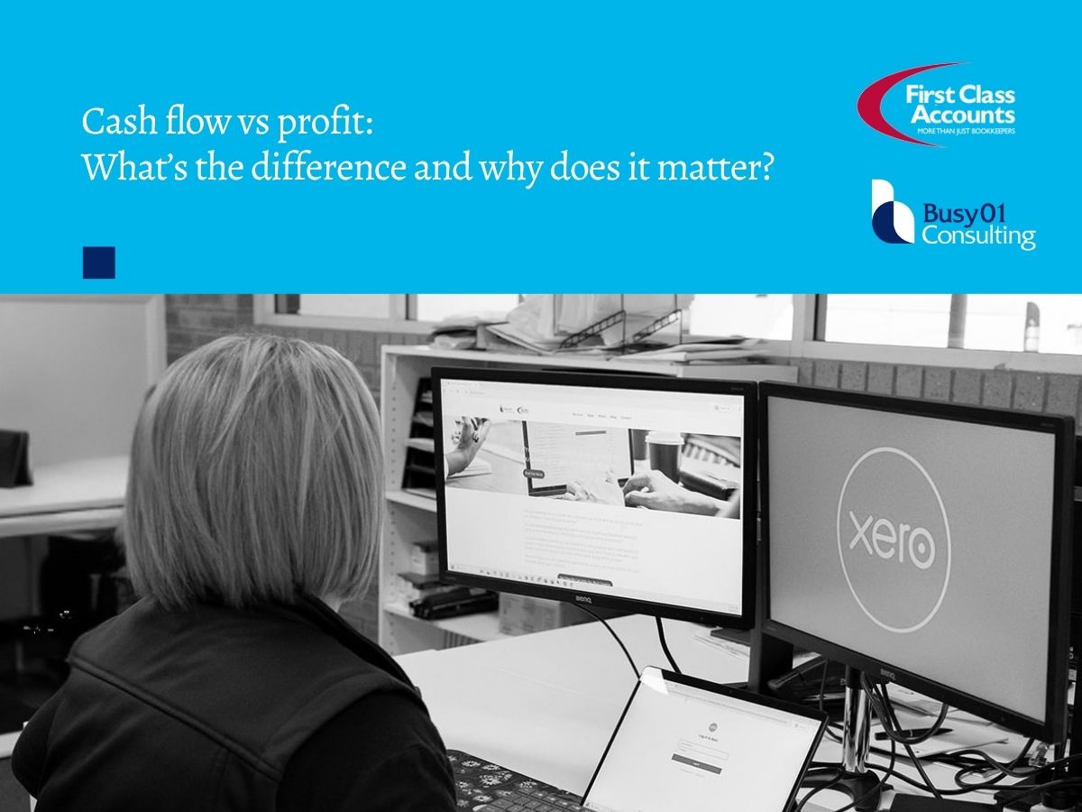 Person working at a desk with dual computer screens displaying Xero, beneath a branded Cash flow vs profit graphic for First Class Accounts and Busy01 Consulting.
