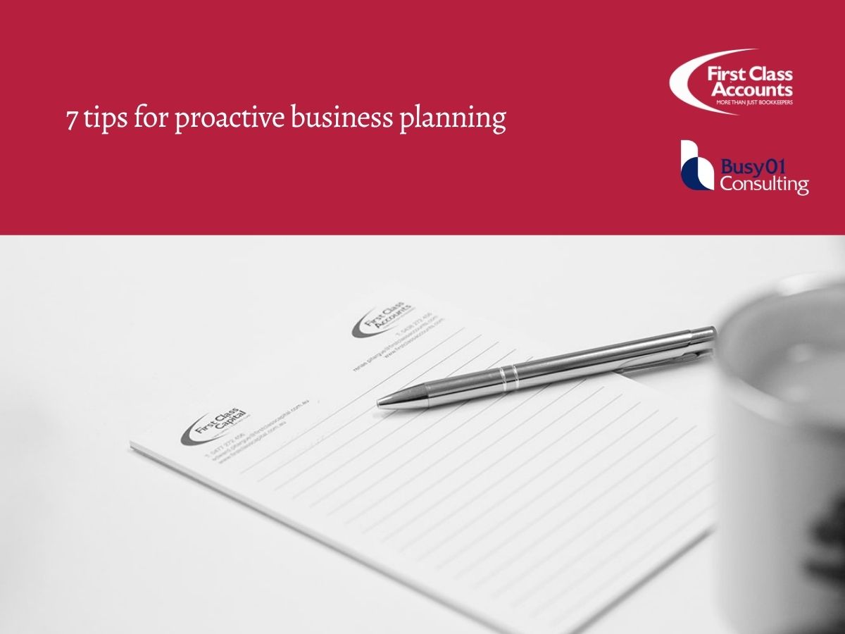 Graphic titled “7 tips for proactive business planning” featuring the First Class Accounts and Busy01 Consulting logos on a burgundy background, above a black and white photograph of a branded notepad and pen on a desk.