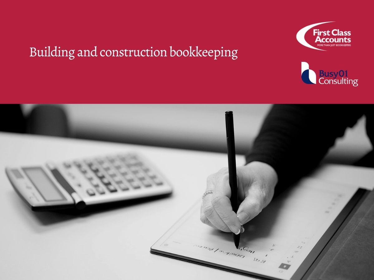 Person writing construction bookkeeping notes on a digital tablet beside a calculator, representing financial tracking and job costing in the building industry